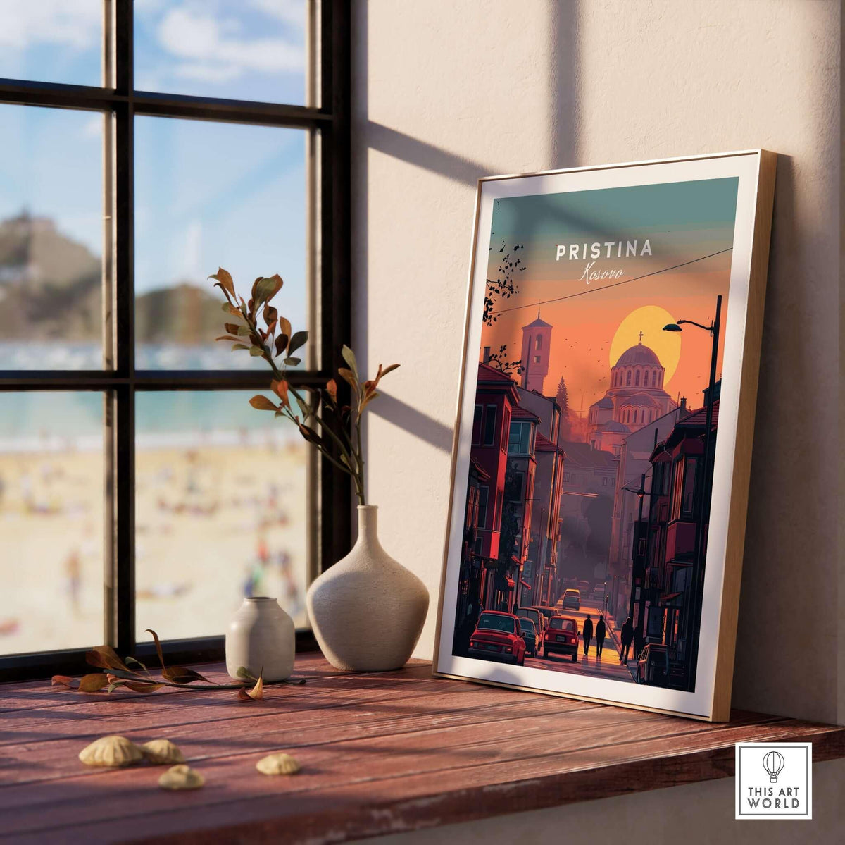 Pristina City Canvas Art Print | Kosovo Travel Wall Decor displayed in a cozy interior setting with a beach view.