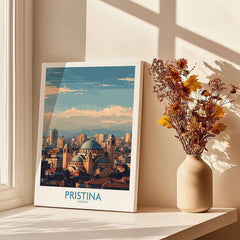 Pristina Kosovo City Skyline Art Print | Christ the Saviour Cathedral Poster displayed by a window.