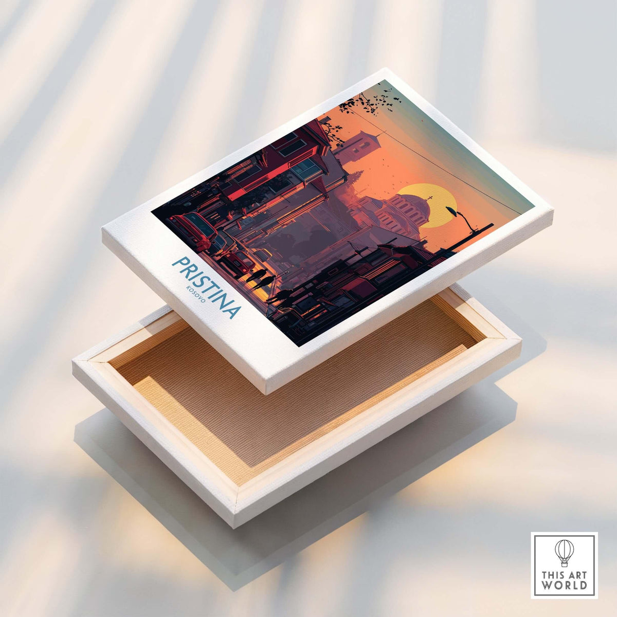 Pristina Kosovo Street Sunset Art Print | Christ the Saviour Church Poster displayed on a wooden box.