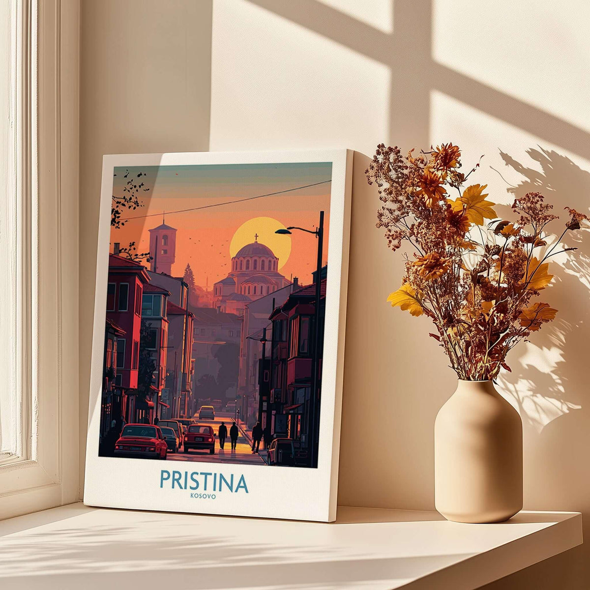 Pristina Kosovo Street Sunset Art Print | Christ the Saviour Church Poster displayed beside flowers in a sunlit room.