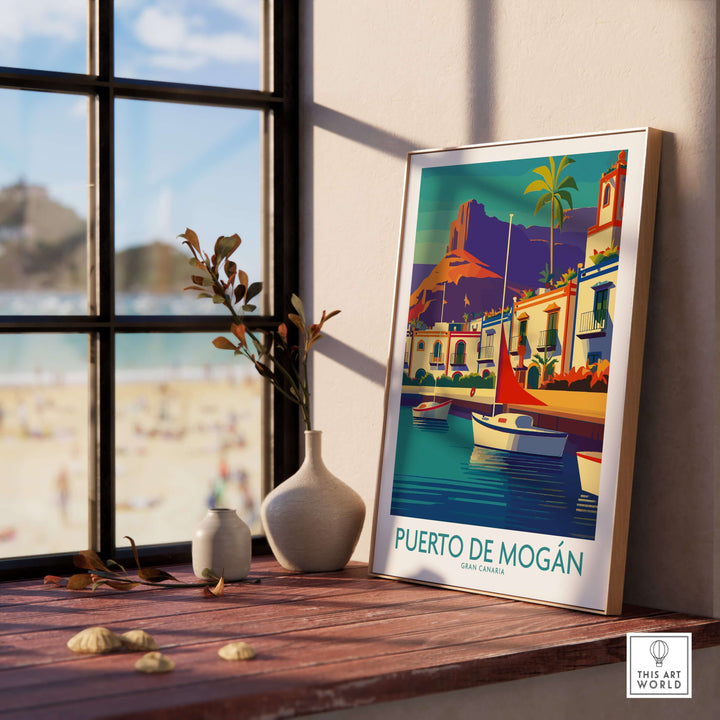 Puerto de Mogán poster art in a sunlit room, showcasing sailboats and coastal views of Gran Canaria.
