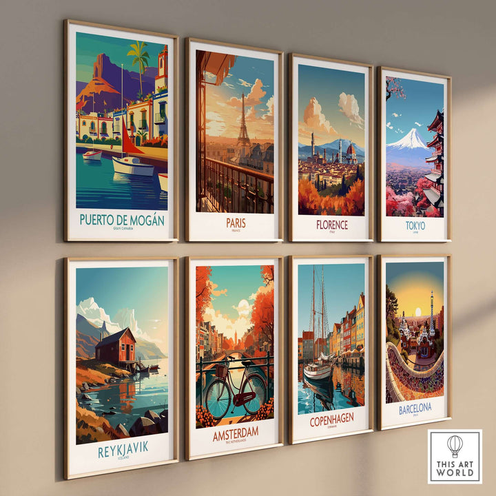 Wall display of vibrant travel posters, featuring Puerto de Mogán, Paris, Florence, Tokyo, Reykjavik, Amsterdam, Copenhagen, and Barcelona.