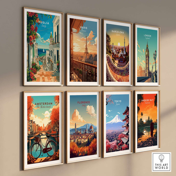 Gallery of framed travel posters featuring Puglia, Paris, Barcelona, London, Amsterdam, Florence, Tokyo, and Angkor Wat against a beige wall.