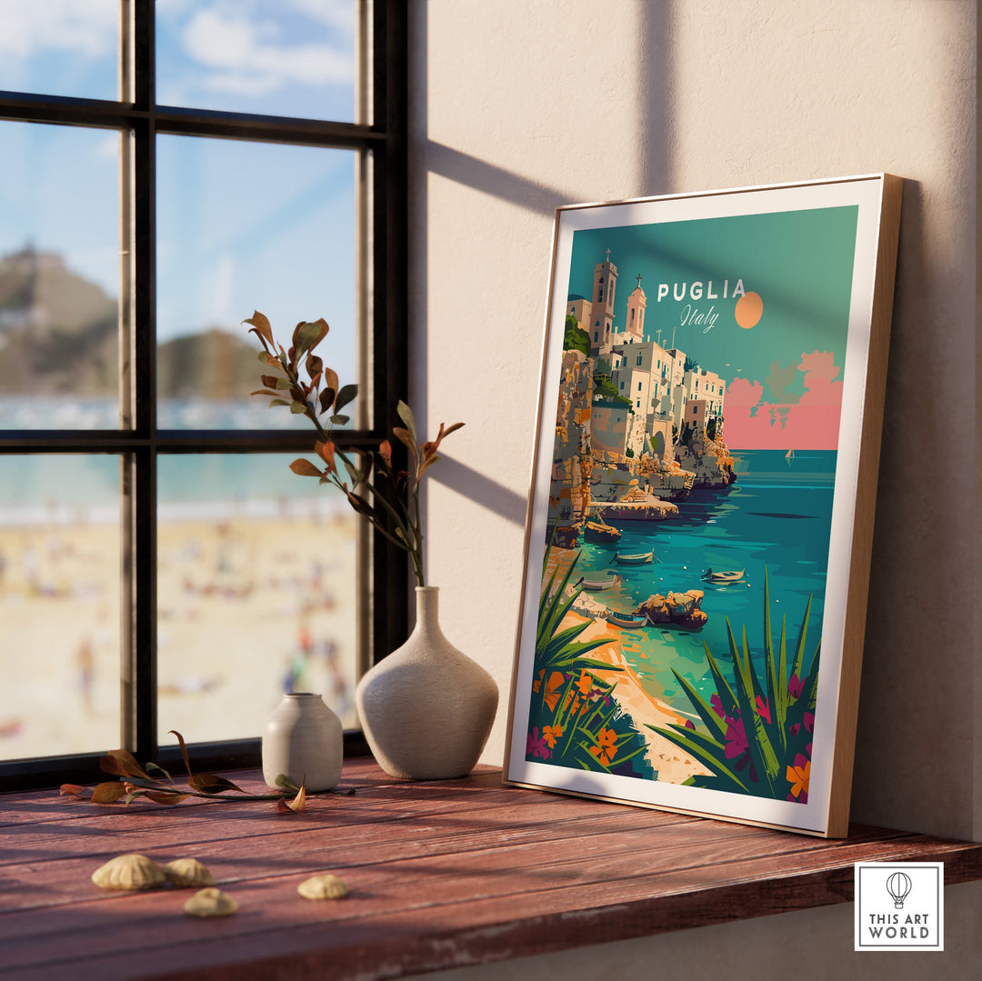 Puglia Poster Print on windowsill with beach view, featuring Italian landscapes and towns, perfect home decor art.