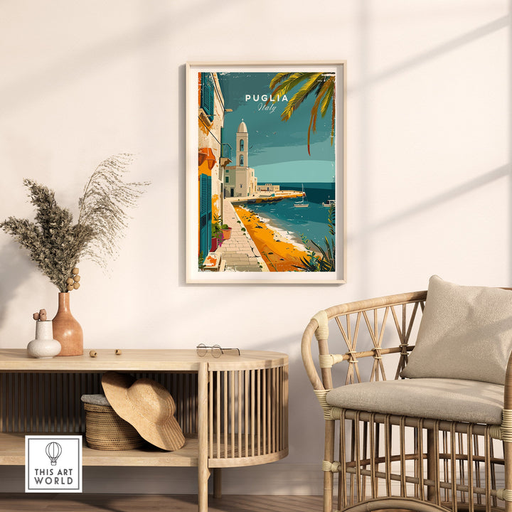 Puglia Wall Art Print - Italy Travel Poster featuring coastal view, displayed in a modern room with wicker furniture and decor.