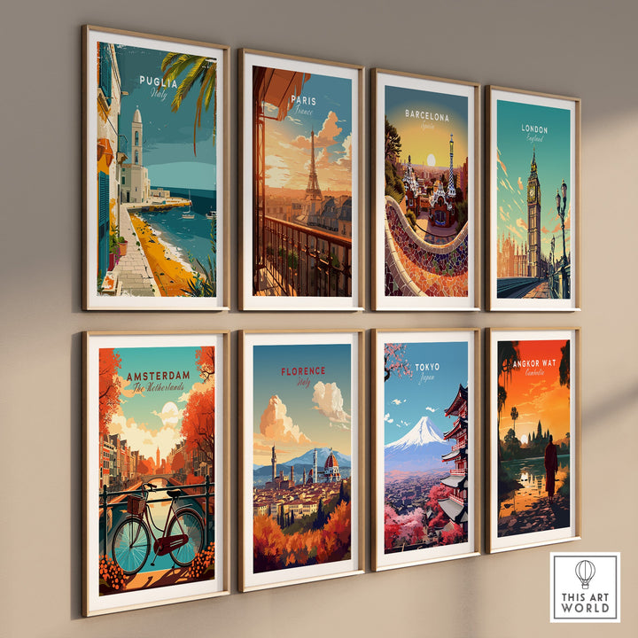 Gallery wall with travel posters featuring Puglia, Paris, Barcelona, London, Amsterdam, Florence, Tokyo, and Angkor Wat.