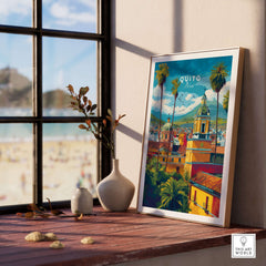 Quito Ecuador Travel Poster Cityscape Print Churches Palm Trees Andes Wall Art Decor on a wooden table near a window.