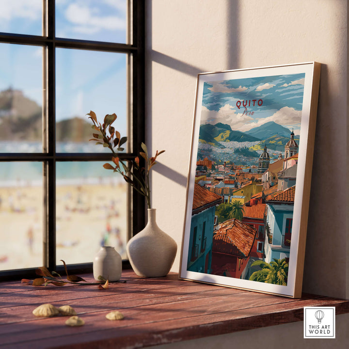 Quito Ecuador travel print poster showing colorful cityscape and Andean hills, framed on a wooden table.