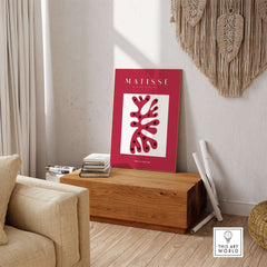 Matisse Art Prints - Red Coral Abstract Black Diamonds Poster showcased in a stylish home setting with warm decor.