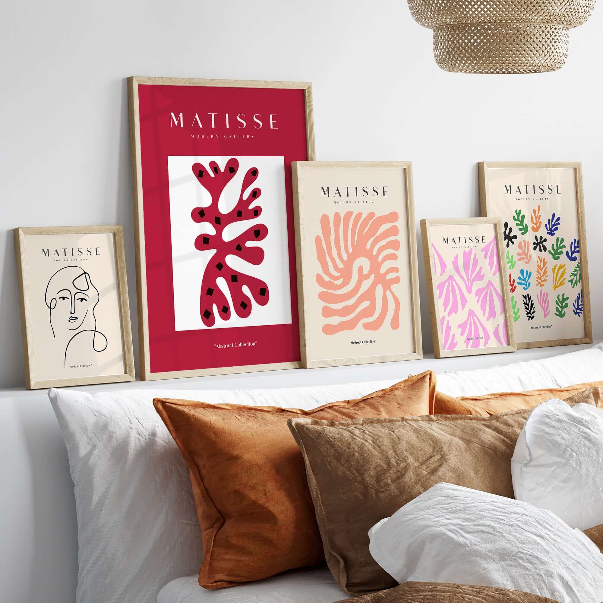 Matisse Art Prints - Red Coral Abstract Black Diamonds Poster displayed on a stylish wall with various other art prints.
