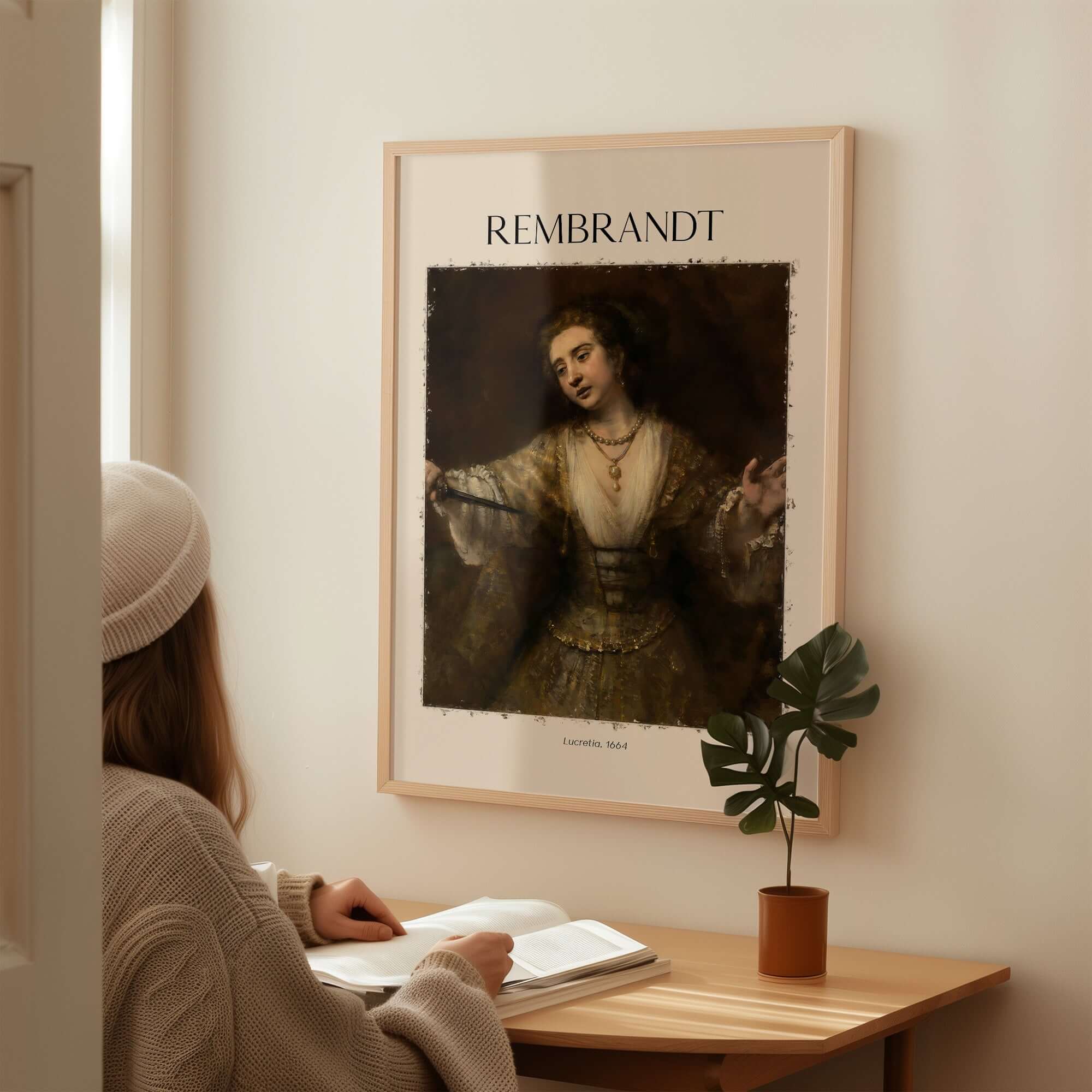Rembrandt Lucretia 1664 Painting Art Print Baroque Historical Poster Wall Decor displayed in a cozy room.