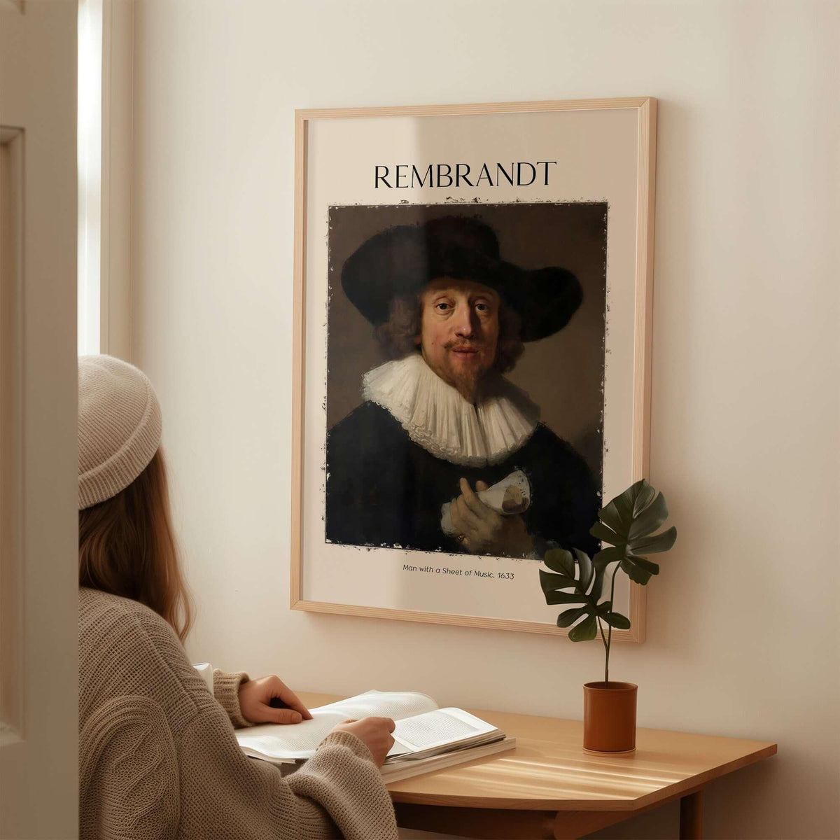 Rembrandt Man with Sheet Music 1633 Portrait Art Print Dutch Master Poster displayed in a stylish interior setting.