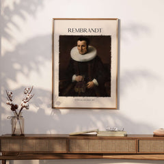 Rembrandt Old Lady with Book 1637 Portrait Print Dutch Golden Age Poster Art displayed on a wall.