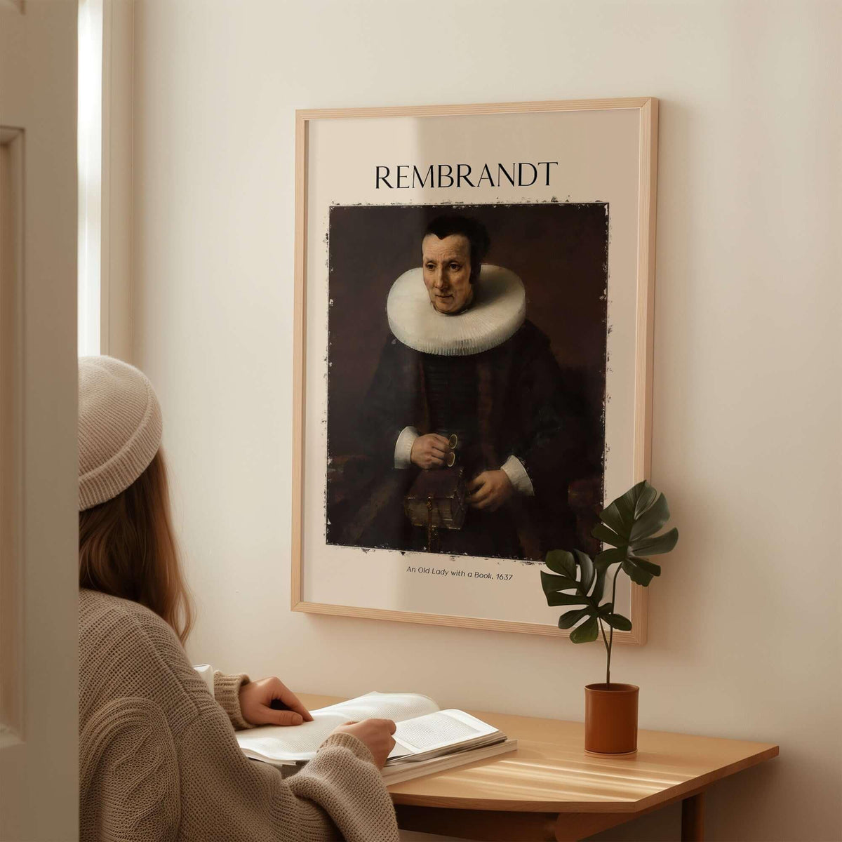 Rembrandt Old Lady with Book 1637 Portrait Print Dutch Golden Age Poster Art displayed in a modern living room.