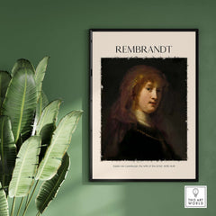Rembrandt Saskia van Uylenburgh Portrait Print Wife Artist Dutch Poster Wall Art framed on a green wall with plants.