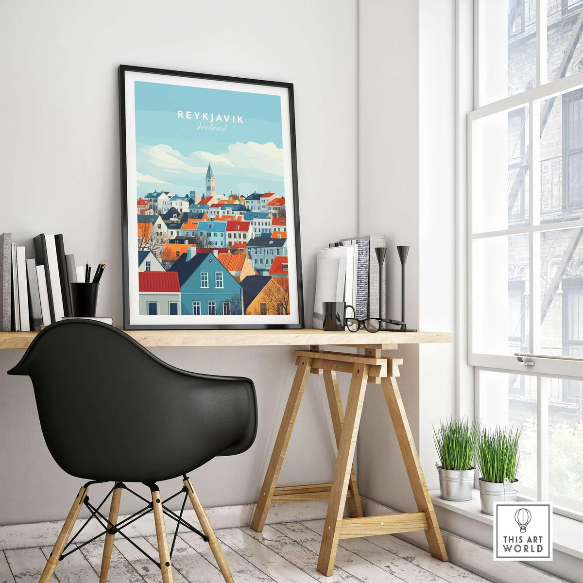 Reykjavik Travel Print showcasing colorful rooftops and landmarks in a stylish home office setting.