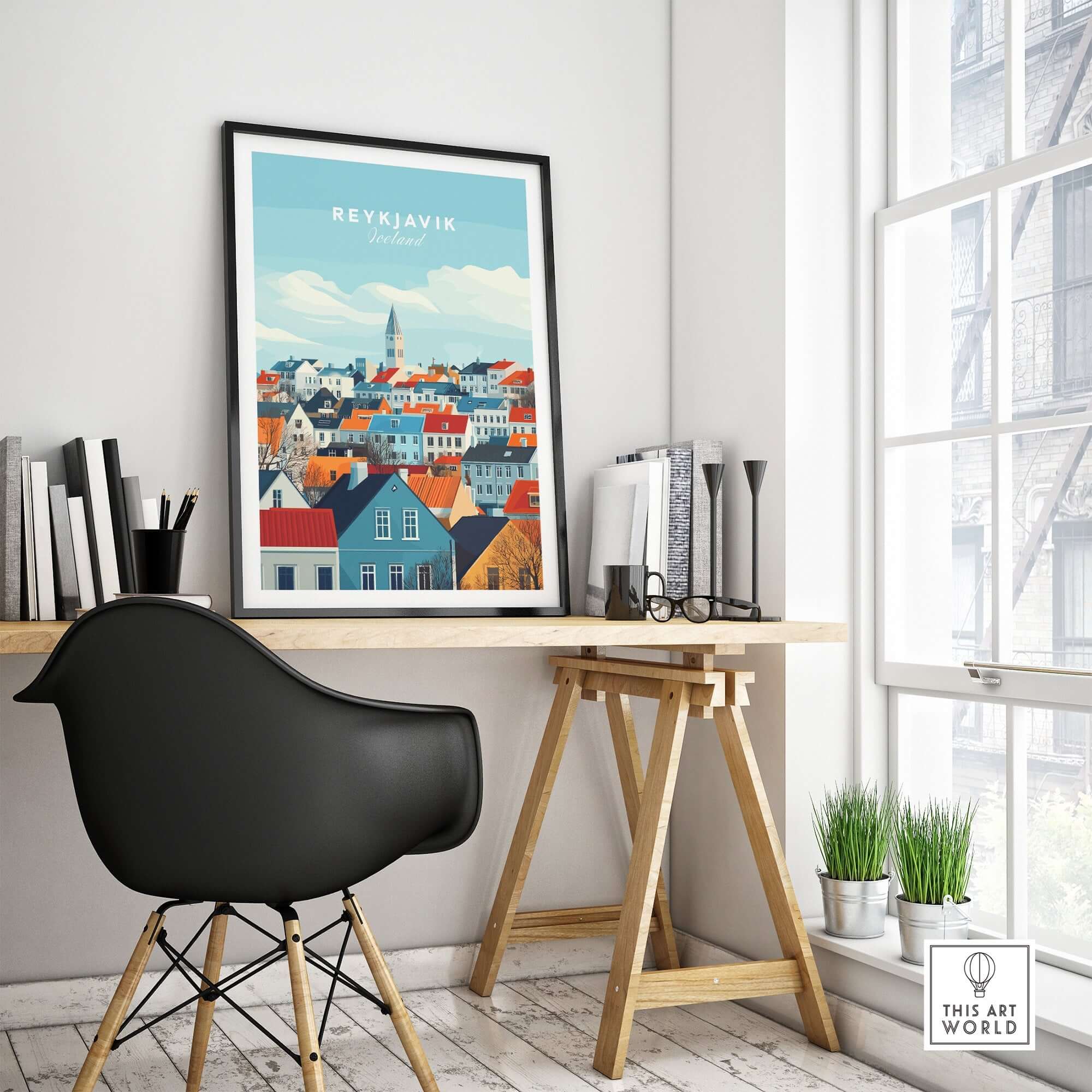Reykjavik Travel Print showcasing colorful rooftops and landmarks in a stylish home office setting.