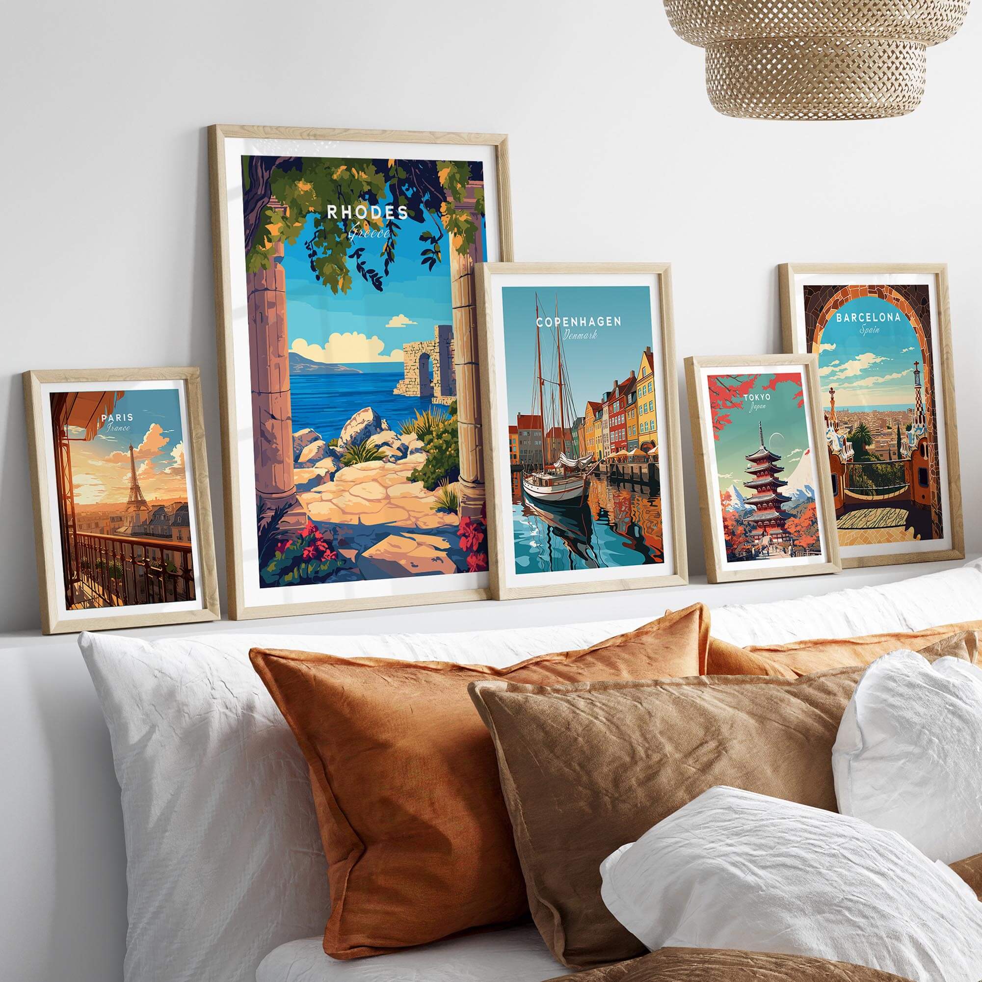 Rhodes Wall Art Print displayed alongside other travel art prints on a stylish bedroom wall.
