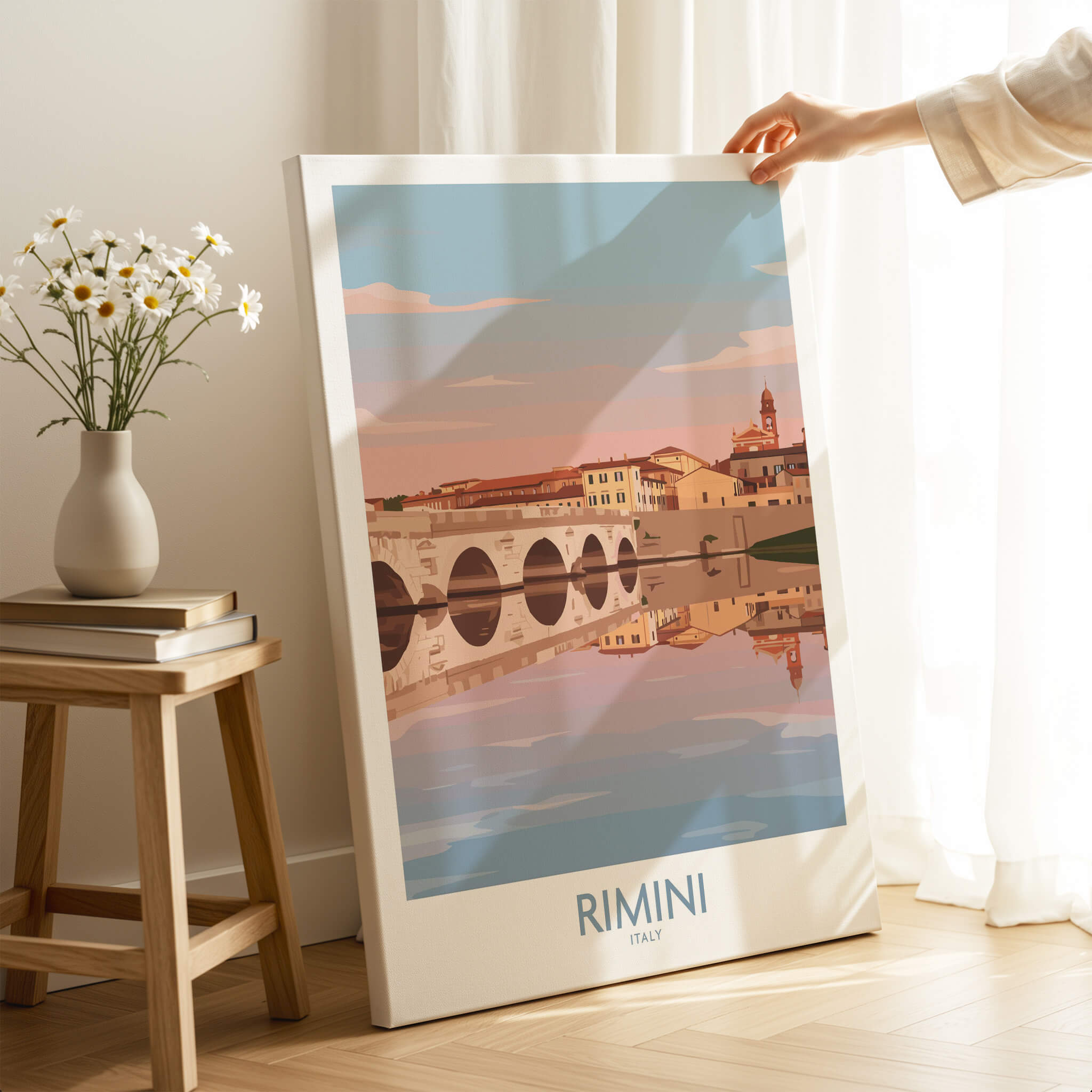 Rimini Italy Poster | Panoramic River Cityscape Scene Canvas Print displayed in a bright interior with flowers.