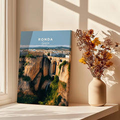Ronda Spain Wall Art Print | Panoramic Andalusian Cityscape Travel Poster displayed on a sunlit windowsill.