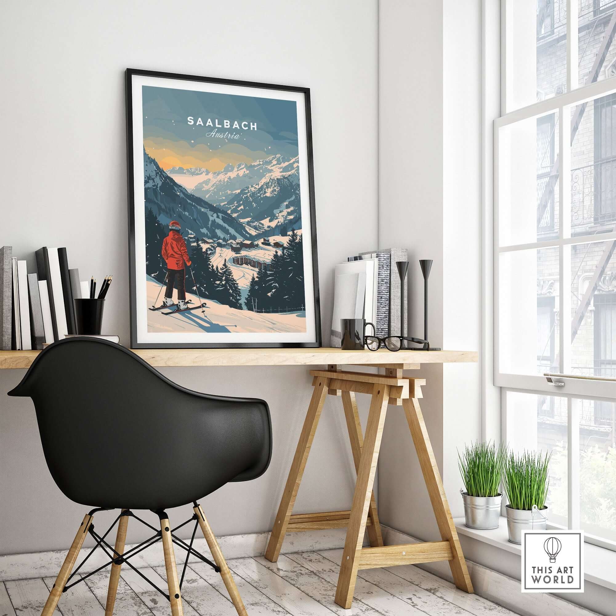 Saalbach travel poster in a stylish home office, showcasing Austrian ski scenery and a serene winter landscape.