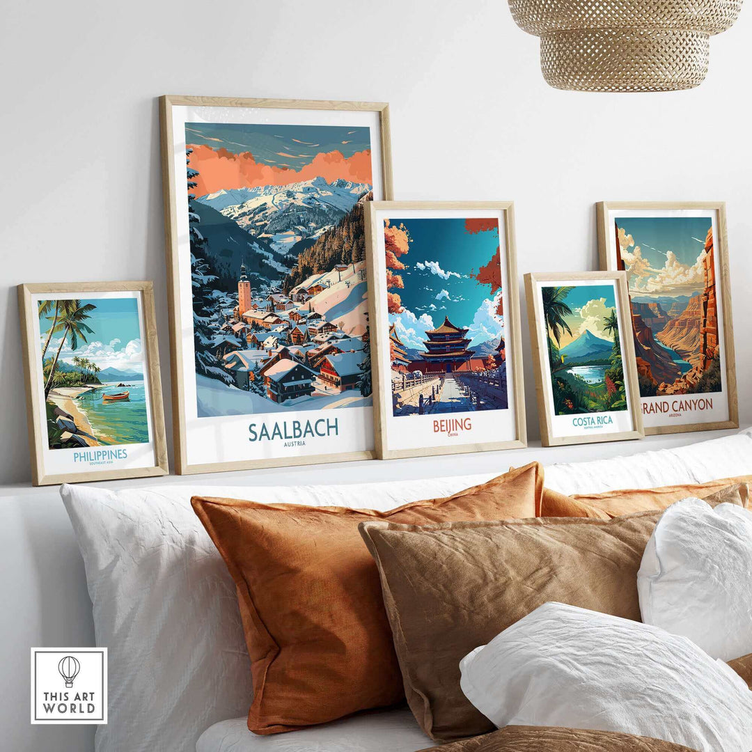 Ski Poster collection featuring Saalbach wall art, displayed with other scenic travel posters in a stylish room setting.