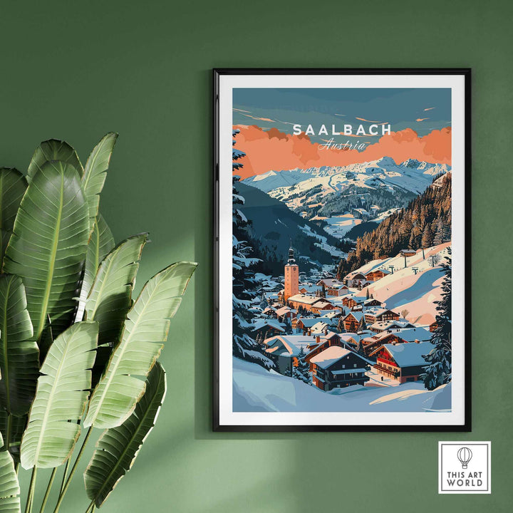 Saalbach wall art print featuring snowy ski village, perfect ski poster decor on a green wall with tropical plants.