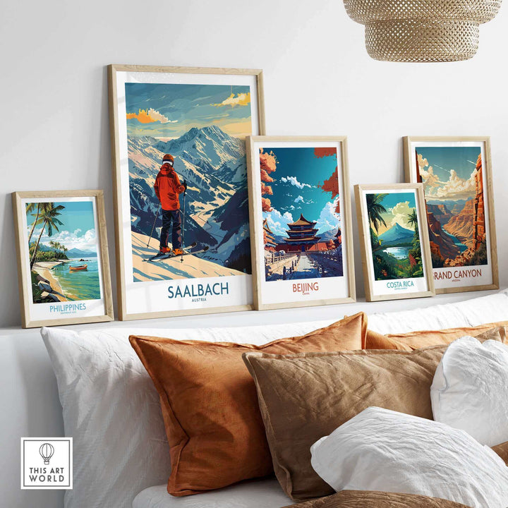 Saalbach ski poster wall art among travel-themed prints in a modern living room setting.