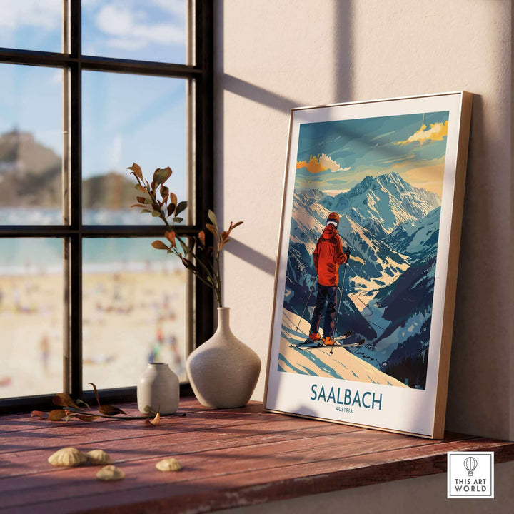 Saalbach Wall Art Ski Print featuring a skier in the Austrian Alps on a windowsill, perfect ski poster decor.