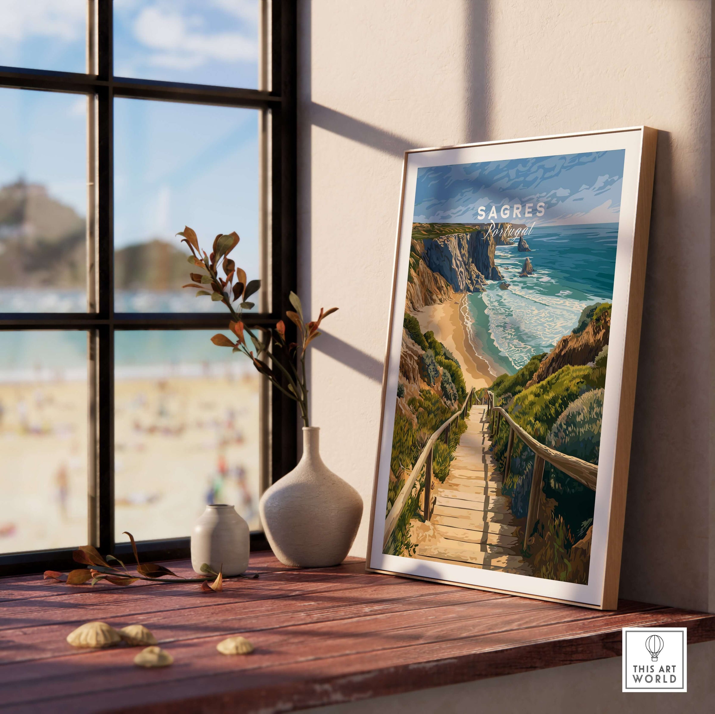 Sagres Algarve Cliffs Beach Print | Portugual Travel Wall Art displayed in a bright room with a wooden table and decorative vase.