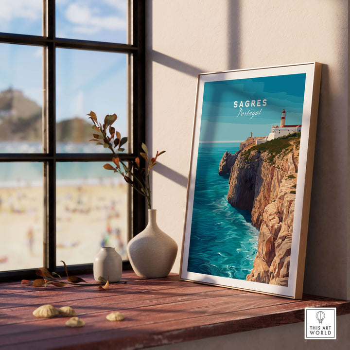 Sagres Wild Algarve Coast View Print | Portuguese Travel Wall Art displayed on a window sill with a scenic ocean view.
