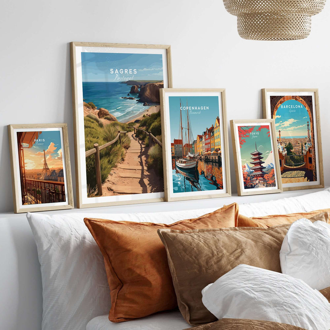 Sagres Algarve Poster - Beach Print displayed among other travel prints on a cozy wall arrangement.