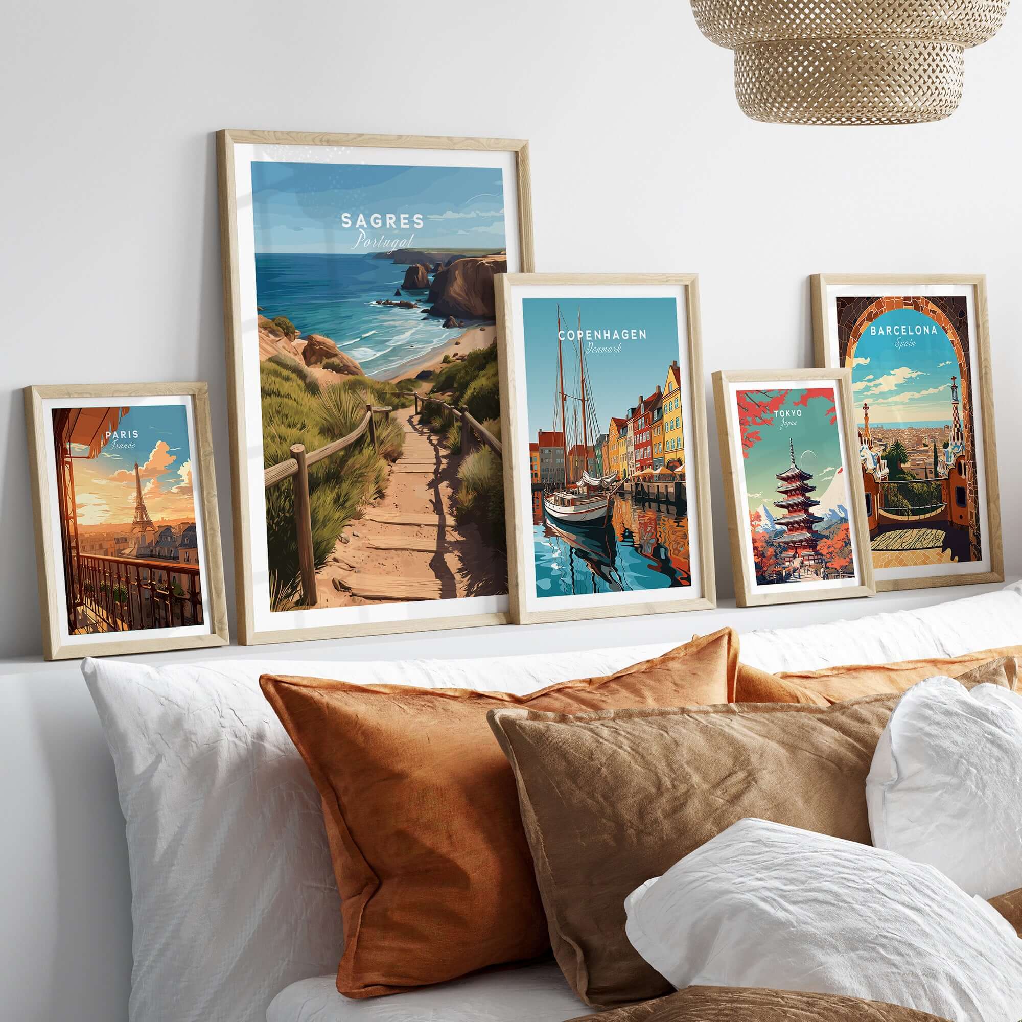 Sagres Algarve Poster - Beach Print displayed among other travel posters in a stylish interior setting.