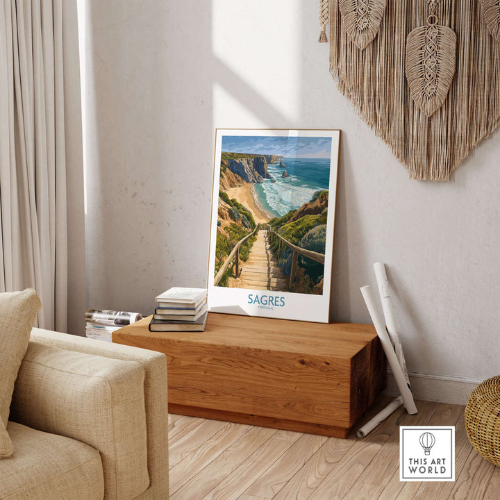 Sagres Poster Portugal Beach Art Print displayed in a cozy living room setting with wooden decor.