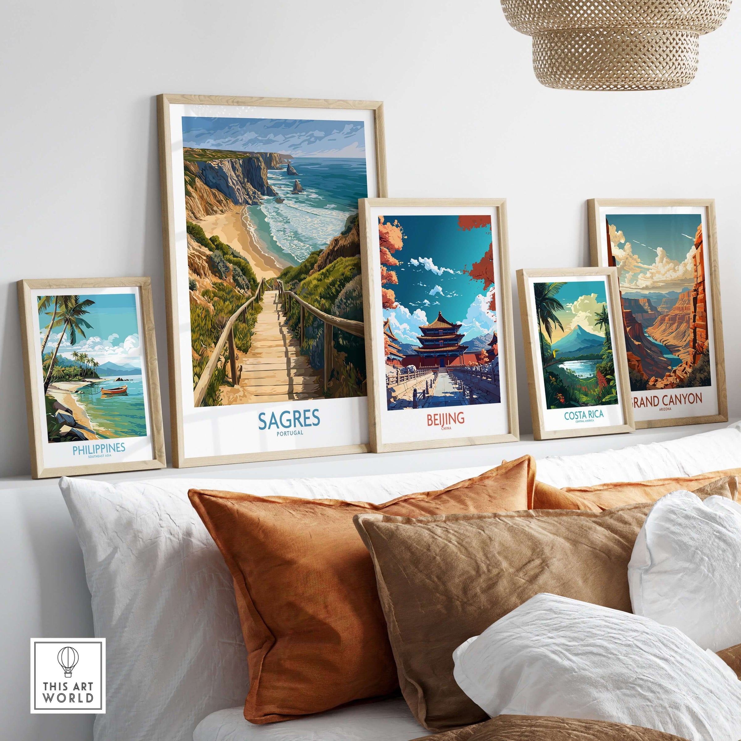 Sagres Poster Portugal Beach Art Print displayed among framed travel posters on a stylish home decor shelf.