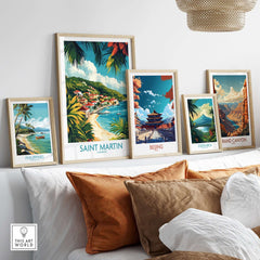 Saint Martin Travel Poster displayed among other travel art prints in a cozy interior setting.