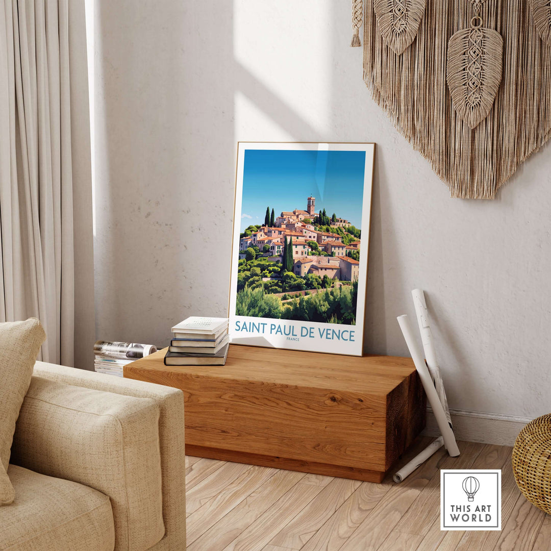 Saint Paul de Vence travel poster displayed in a cozy living room, showcasing the beauty of the French Riviera.
