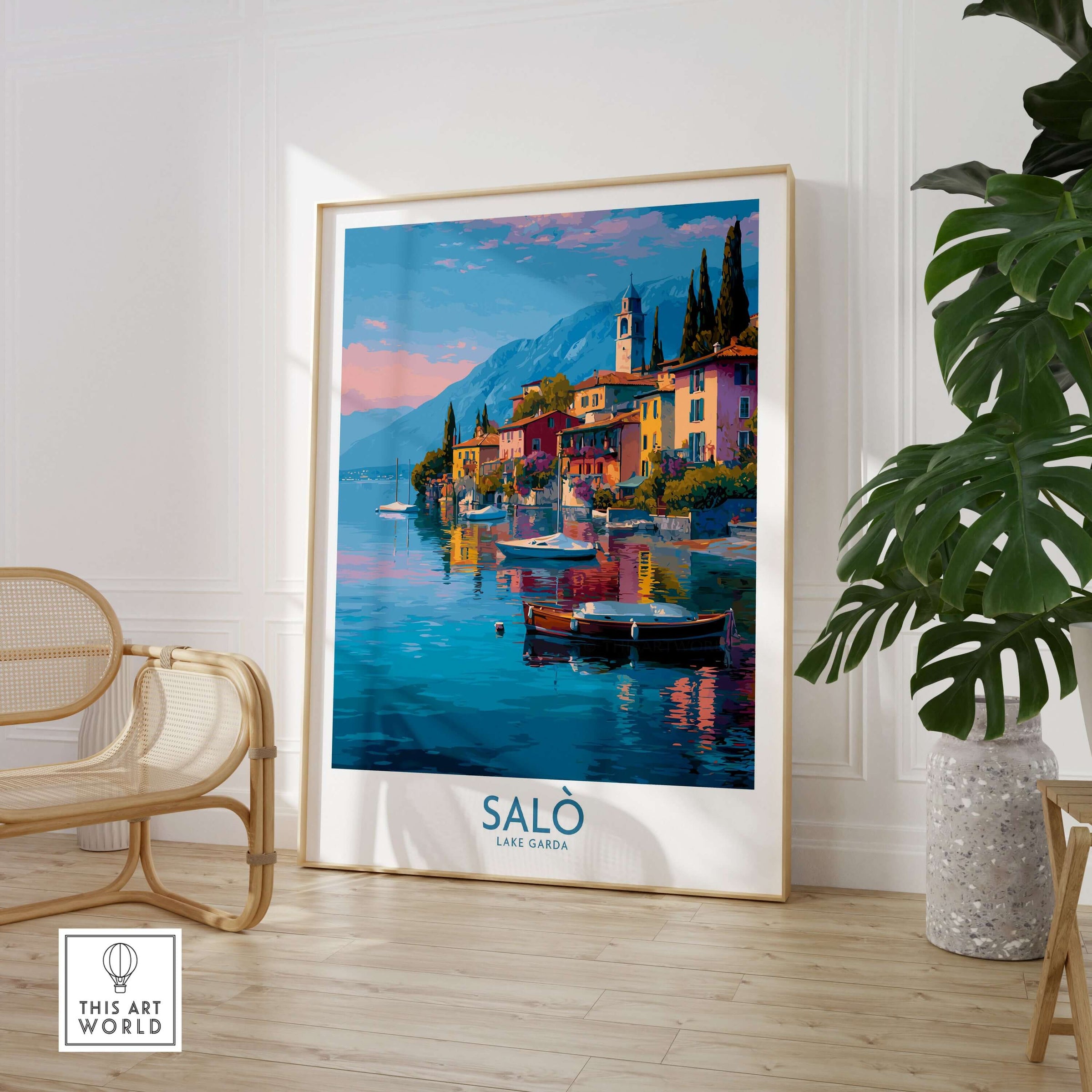 Salò Lake Garda Italy Sunset Art Print | Lakeside Boats Poster hanging in a beautifully designed room with plants.