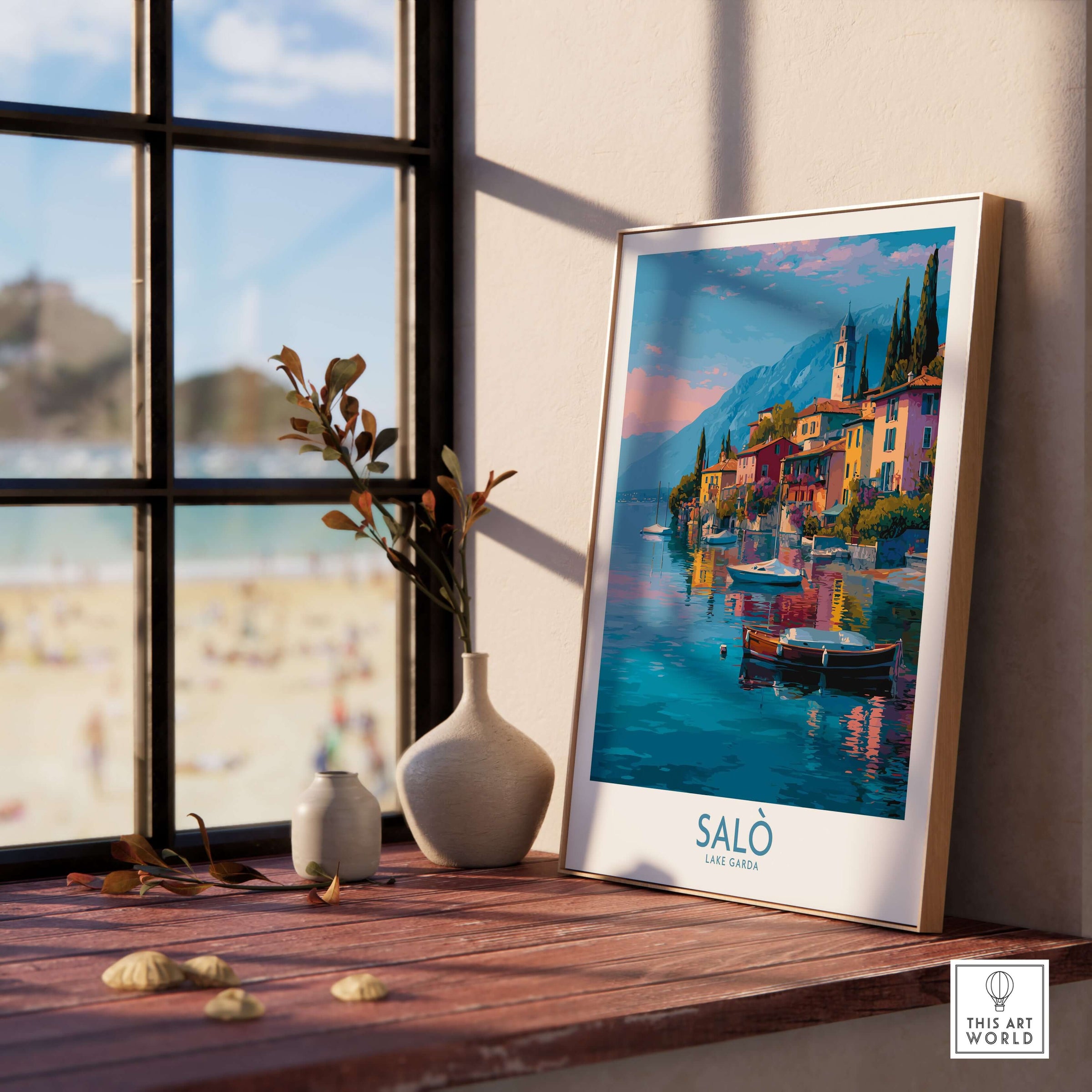 Salò Lake Garda Italy Sunset Art Print | Lakeside Boats Poster displayed in a sunlit room with a view of the beach.