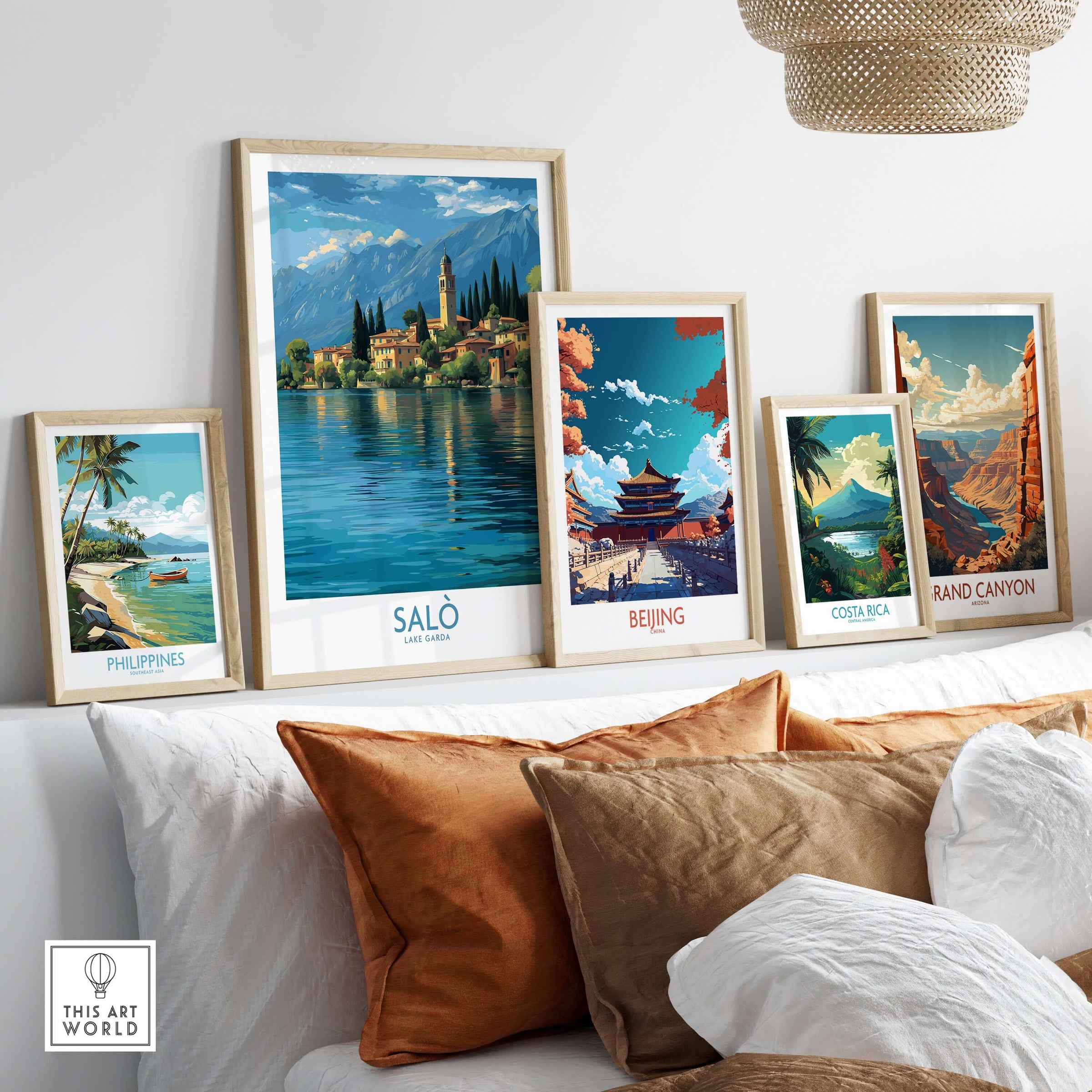 Salò Lake Garda Italy Village Art Print | Coastal Town Landscape Poster among other travel art prints on a stylish sofa.