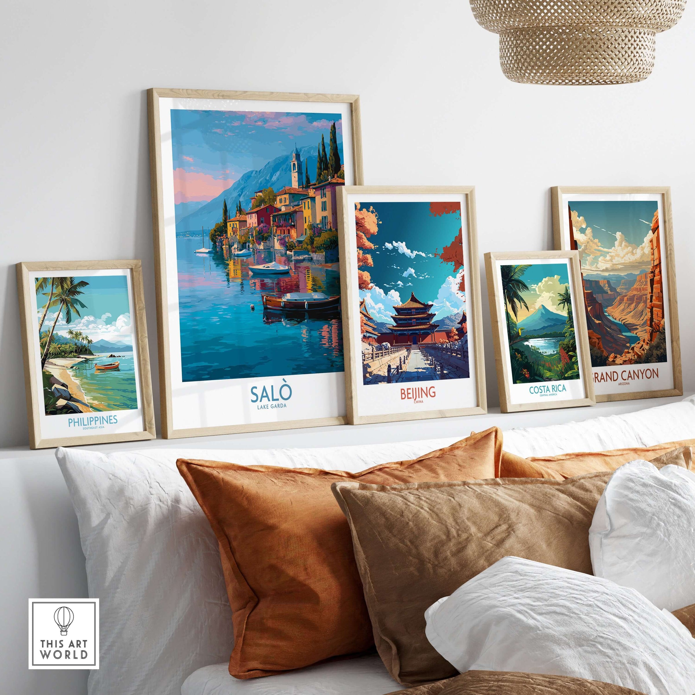 Salò Lake Garda Italy Sunset Art Print | Lakeside Boats Poster displayed among other travel art prints on a cozy couch.