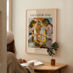 Salvador Dali Madonna Port Lligat 1949 Surrealist Religious Art Print Poster Gala showcasing a woman admiring the artwork.