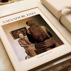 Salvador Dali The Angelus of Gala 1935 Surrealism Double Image Art Print Poster displayed on a wooden table.