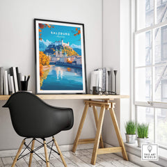 Salzburg Travel Print hanging in a stylish home office decor featuring a scenic view of Salzburg.