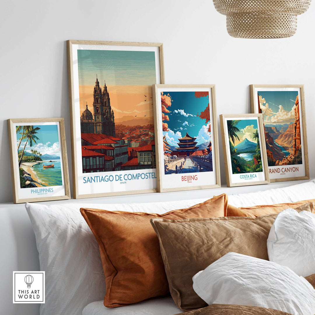 Santiago de Compostela Poster displayed among other travel posters on a stylish couch, showcasing vibrant art and design.