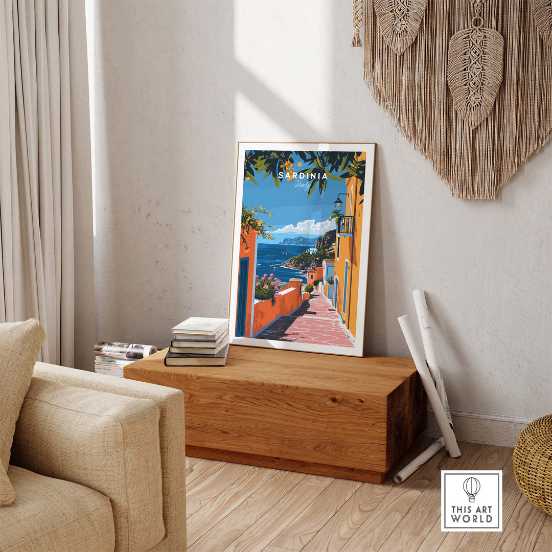 Sardinia Art Print featuring coastal landscape with Mediterranean Sea, rugged cliffs, and rustic villages on a wooden shelf in a cozy room.