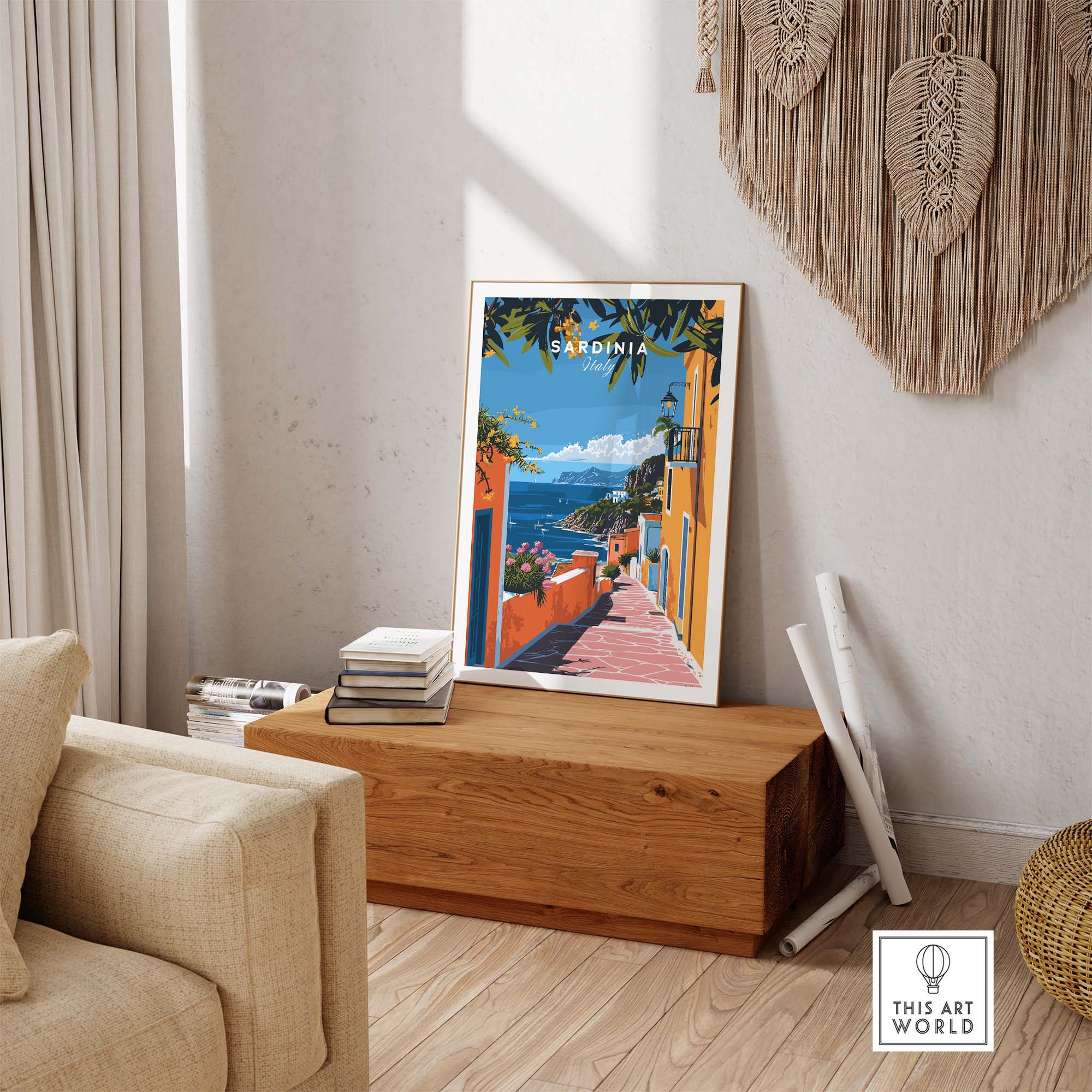 Sardinia Art Print - Coastal Landscape Wall Decor displayed in a cozy living room setting, showcasing vibrant coastal colors.