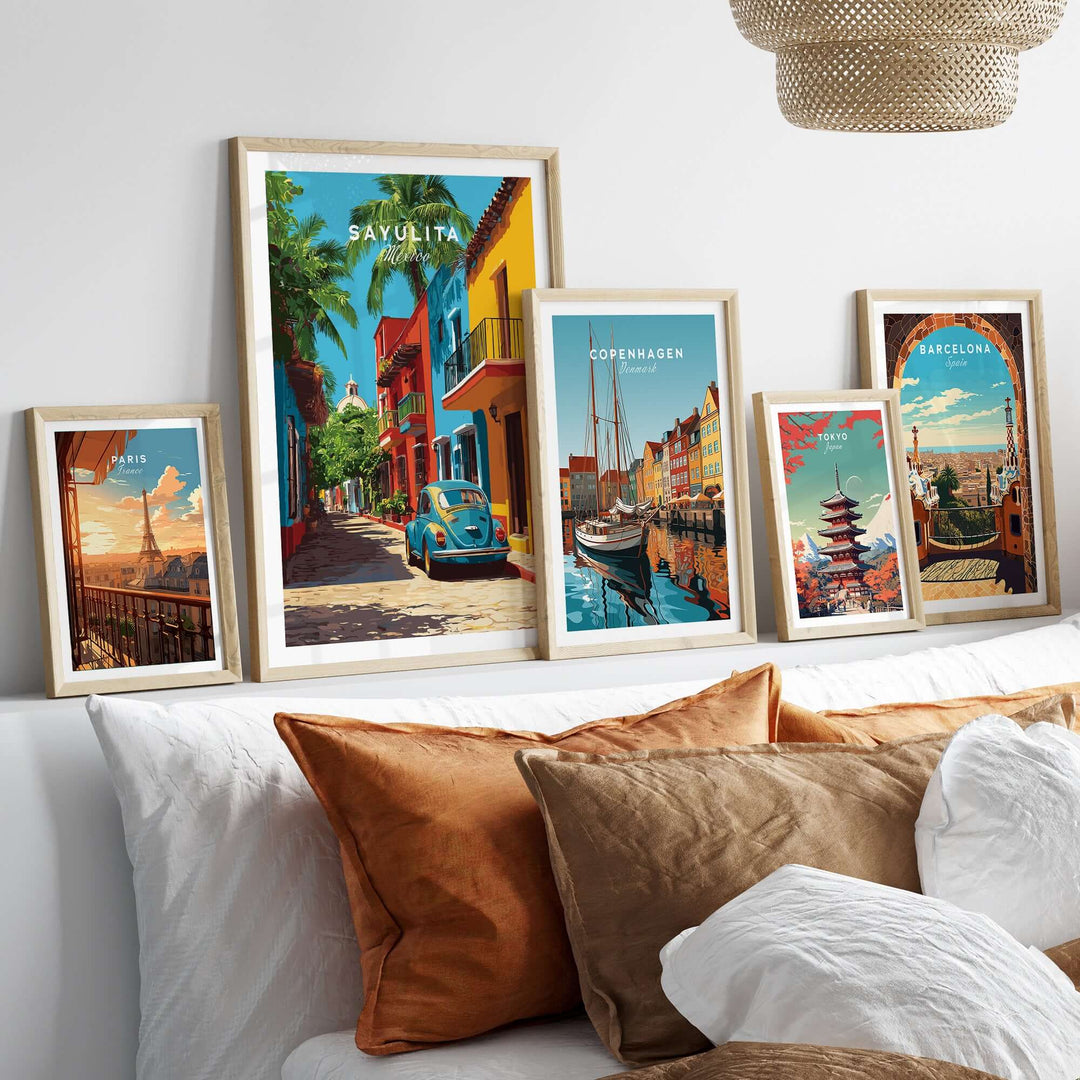 Sayulita Print | Mexican Town Wall Decor framed art displayed on a couch with colorful pillows.