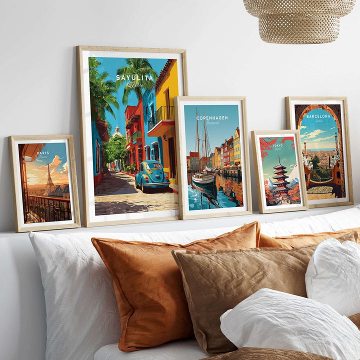 Sayulita Print | Mexican Town Wall Decor framed art displayed on a couch with colorful pillows.