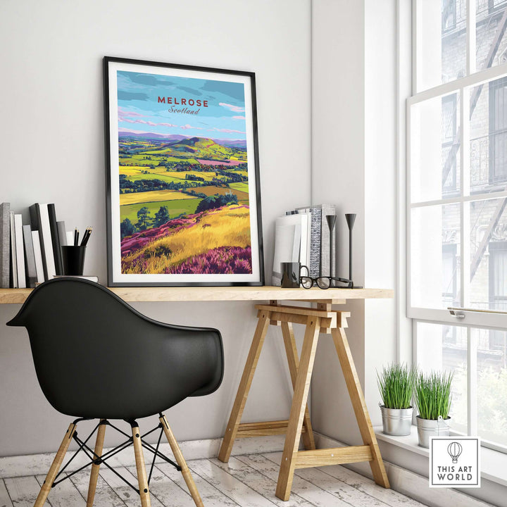 Melrose Scotland landscape travel print in a bright home office setting with modern decor and greenery.